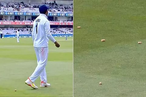 Fans throw bottle corks at Rahul