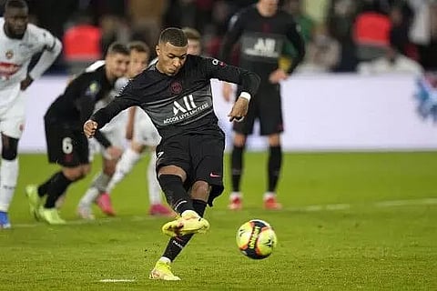 PSG need late Kylian Mbappe penalty to beat Angers