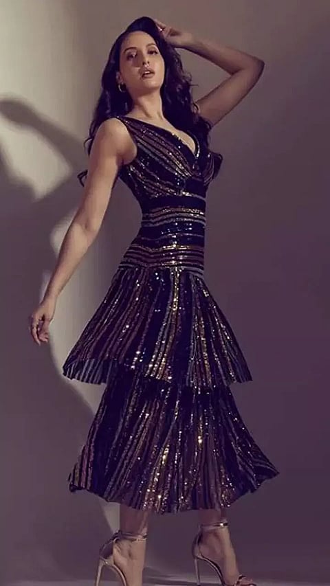 Nora Fatehi in Stylish Midi Dresses