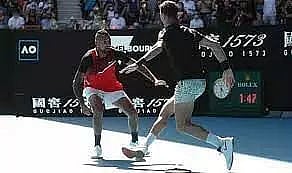 Kyrgios shouts at a fan as he storms to Australian Open men's doubles final