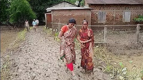 Assam: Cachar DC Walks Through Mud To Inspect Flood Affected Areas, Picture Goes Viral