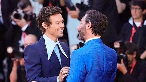 Harry Styles Kisses Nick Kroll At Venice Film Fest