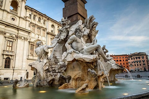 Climate activists turn Rome’s famous fountain black, arrested
