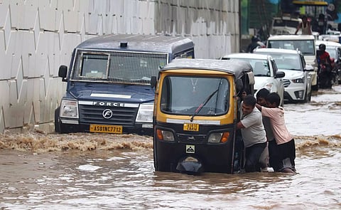 Minister Ashok Singhal takes stock of urban flooding in Guwahati