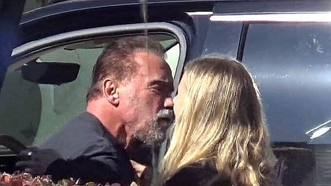 Hollywood star Arnold Schwarzenegger caught kissing mystery woman