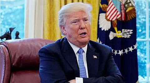 Trump slaps tariffs on imported washing machines, solar panels