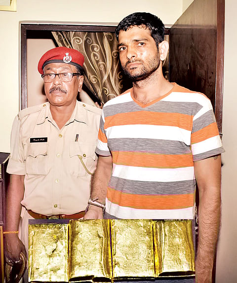 Gold bars, silver-coated rods seized
