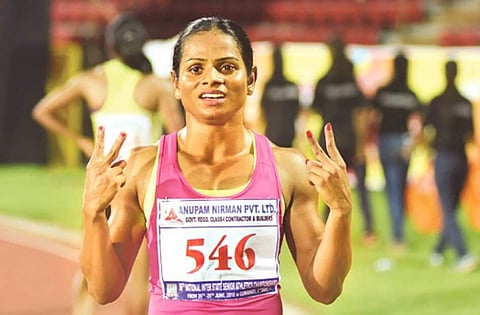 Dutee breaks own record, wins gold in 100m