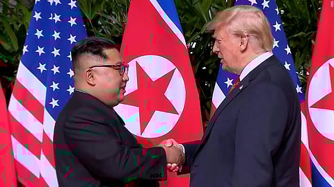 Trump-Kim’s High Five