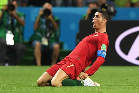 Ronaldo magic denies Spain in six-goal thriller
