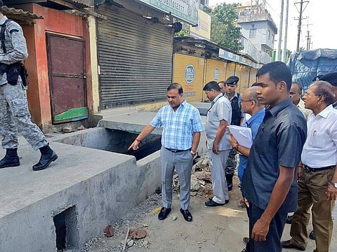 Himanta inspects roads, drains at 6 Mile area