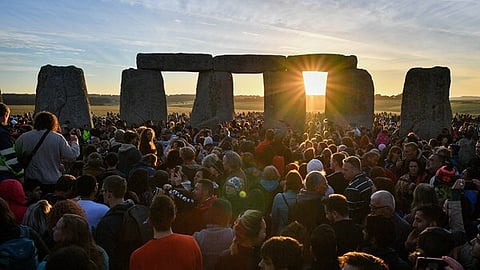 Summer solstice draws crowds of merrymakers