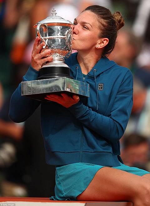 Halep wins maiden Grand Slam title at French Open