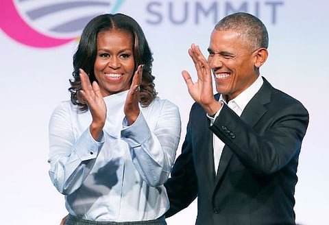 Barack and Michelle Obama filmed dancing at Beyonce and JAY-Z's concert