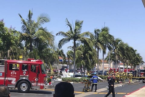 5 Killed After Small Plane Crashes In Southern California Parking Lot