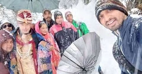 A groom who made his way amid heavy snow fall to marry his bride in Uttarakhand