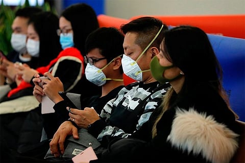 Hong Kong to drastically cut cross-border travel with China