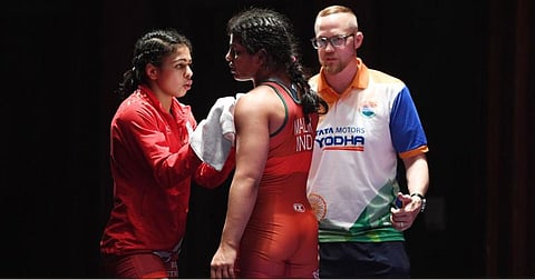 Indian women’s wrestling team coach Andrew Cook leaves for US