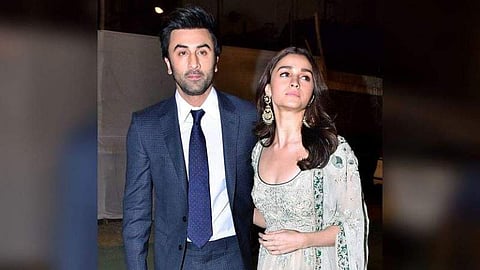 Ranbir Kapoor giving a peck on Alia Bhatt’s cheek, picture goes viral