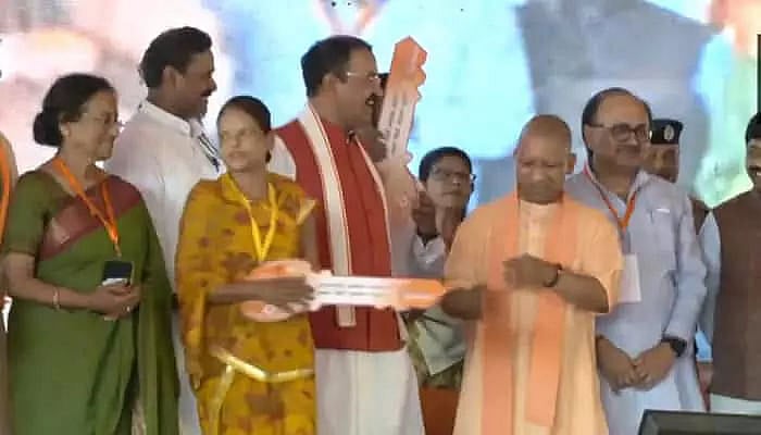 UP CM Adityanath Hands Over 76 Housing Units Built on Atiq Ahmed's Land ...