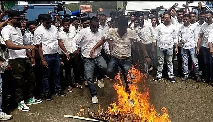 All Tea Tribes Students Association activists burn effigy of All ...