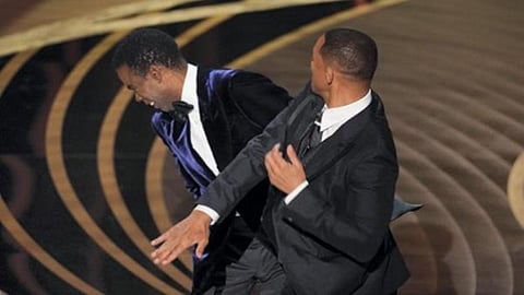 Chris Rock Jokes About Will Smith's Oscars Slap During Standup Set: 'Got Most of My Hearing Back'