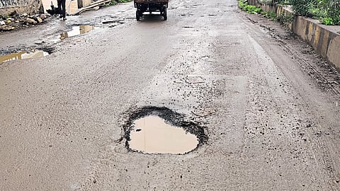 Potholes in front of Kakani Cinema on Mosam Bridge, the main bridge in the city Latest marathi news