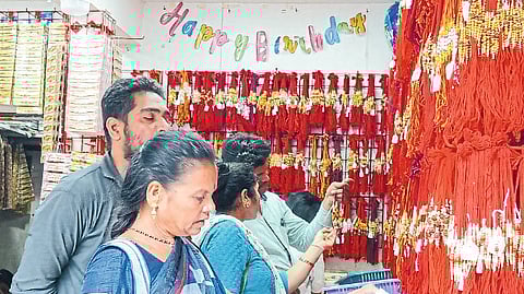 Women buying rakhi.