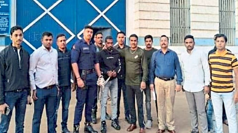 Prisoner taken into custody by police