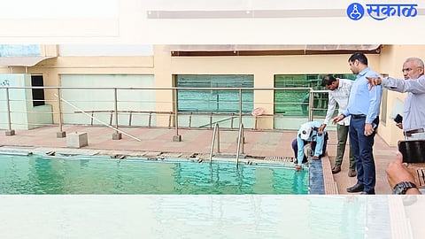 Jalgaon: Collector Aman Mittal inspecting the swimming pool in the district sports complex.