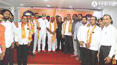 Guardian Minister Dada Bhuse while welcoming Shiv Sena's Shinde faction by office-bearers of Maharashtra Navnirman Shiksha Sena