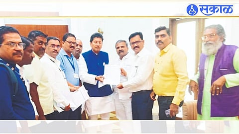 Keshav Jadhav, Rajesh Surve, Shivaji Sakhre while giving a statement along with Education Minister Deepak Kesarkar on behalf of State Intermediate Teachers Association in Mumbai.