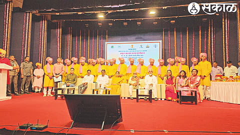Guardian Minister Dada Bhuse present while giving the amritkalash brought from each taluka to the representatives of Nehru Centre.