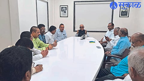 Former Minister Rohidas Patil speaking in the meeting regarding the planning of Kisan Samvad Yatra of Congress. Neighbor former MLA D. S. Ahire, former MP Bapu Chaure and other officials.