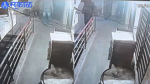 CCTV footage shows the robber walking out with a tommy in his hand