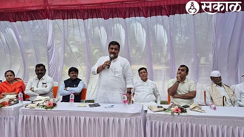MLA Rahul Dhikle speaking at the commencement of development works worth four crores in Ward Two in Adgaon. dignitaries with