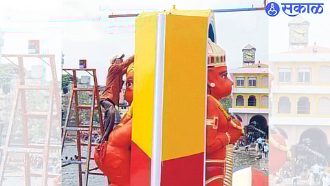Artists who paint the famous Dutonya Maruti on the occasion of Hanuman Janmotsav.