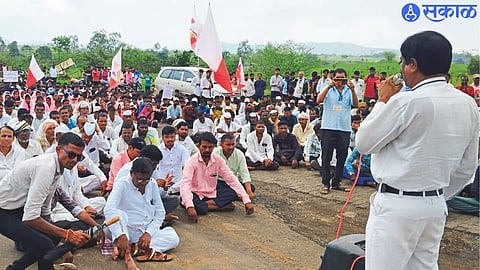 Jiva Pandu Gavit while guiding tribal brothers during Chakkajam agitation on Nashik-Gujarat highway.
