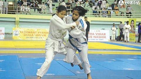 A tense moment at the Western Division Women's Judo Tournament at the Divisional Sports Complex.