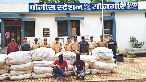 Assistant Police Inspector Sachin Kapadnis and colleagues along with seized contraband gutkha, tobacco and suspects.