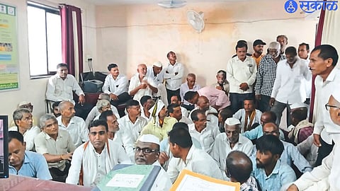 Farmers of Javkhede during a sit-in protest at Taluka Agriculture Office on Friday.