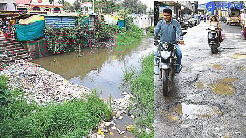 Potholes on the road outside the Bhairavnath temple. the Saraswati in the market is flooded in the river bed