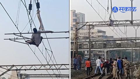 Drunk youth climbs on electric wires of railway
