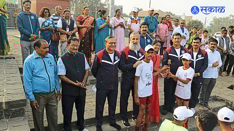 New English School students celebrate after successfully completing the 125 km relay race, marking a historic achievement in school sports.