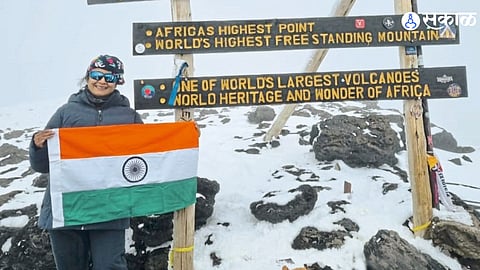 Dr. Manisha Laddha from Shevgaon triumphantly hoisting the tricolor flag on Mount Kilimanjaro."