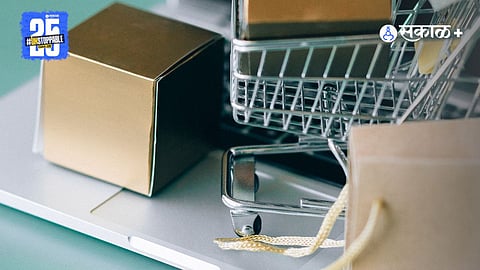 Image of shopping cart, box, bags and laptop. Article context  Effects of Income Tax Changes on Economic Growth