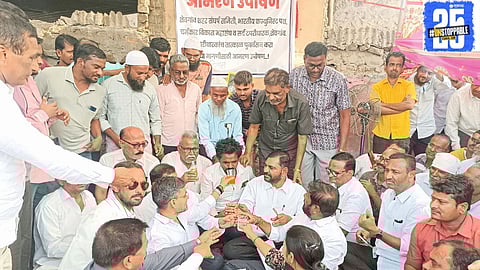 "Business owners end their five-day hunger strike after receiving written assurance from the administration, mediated by Nilesh Lanke."