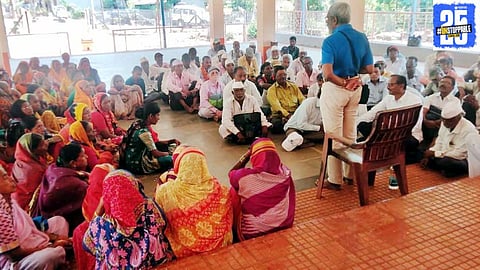 Farmers gathered in Koynanagar, demanding land distribution in Dr. Patankar's presence, vowing to stay until their demands are met."
