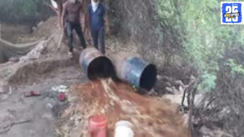 Police raid an illegal handcrafted liquor den, taking the woman operator into custody for her involvement in the illegal alcohol trade.
