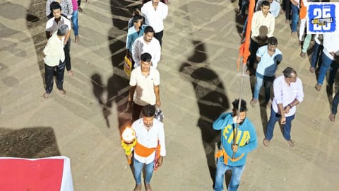 Youth pay tribute to Chhatrapati Sambhaji Maharaj with silent participation in a barefoot march."